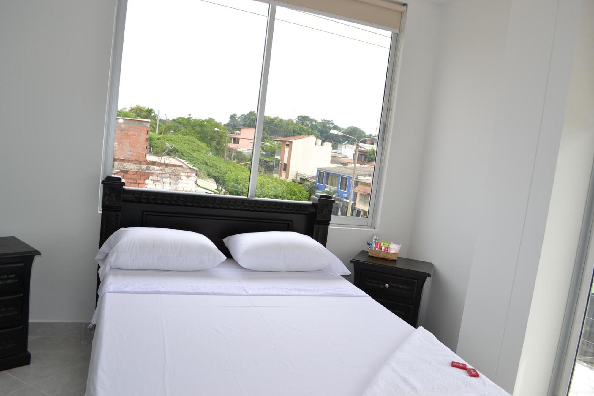 Hotel Brasil Puerto Boyaca Buitenkant foto